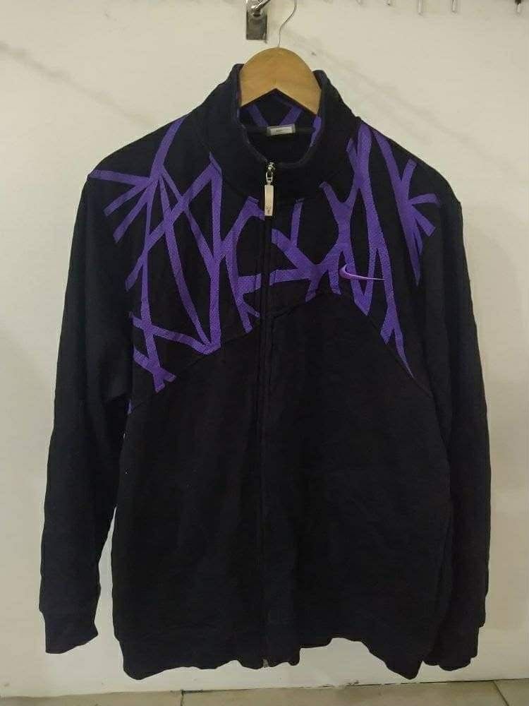 Nike Kobe Bryant Mamba Mentality Track Jacket (Category: Coats, Jackets and Outerwear) located in Rizal. Submitted by youngwolf-5f02 (Listing ID 1463166684, Image 2). Description: - Rare Retro Kobe Jacket - Black Nike track jacket - Thick and soft fabric - Purple Mamba Mentality logo on the back - Cool purple abstract design on the front - Fully Embroidered Kobe logos - Full zip closure - Ideal for casual wear or sports.