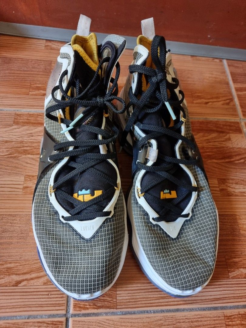 Nike LeBron 19 "King" (Category: Sneakers) located in Paranaque City. Submitted by saifgohar988676 (Listing ID 1463142364, Image 1). Description: - Nike LeBron 19 Basketball Shoes - Size: 12.5 US - Unique speckled upper design - Visible Air unit in the sole for cushioning - Black laces with yellow and light blue accents - Perfect for basketball or everyday casual wear.