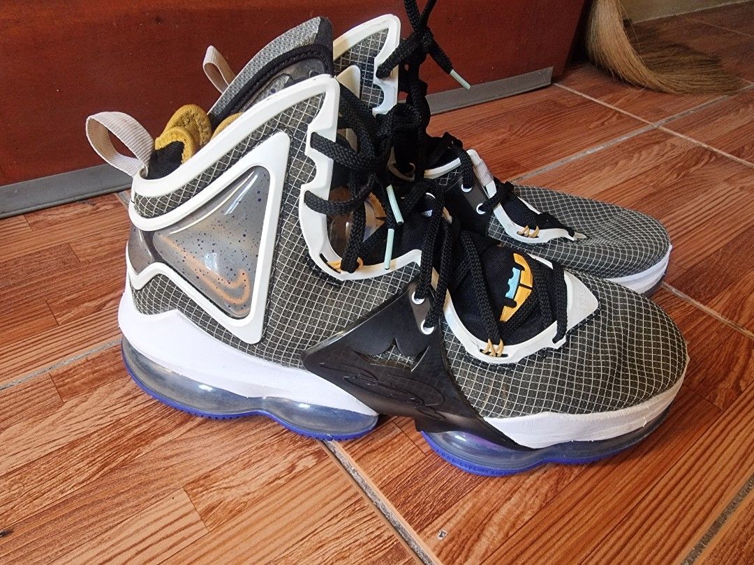 Nike LeBron 19 "King" (Category: Sneakers) located in Paranaque City. Submitted by saifgohar988676 (Listing ID 1463142364, Image 2). Description: - Nike LeBron 19 Basketball Shoes - Size: 12.5 US - Unique speckled upper design - Visible Air unit in the sole for cushioning - Black laces with yellow and light blue accents - Perfect for basketball or everyday casual wear.