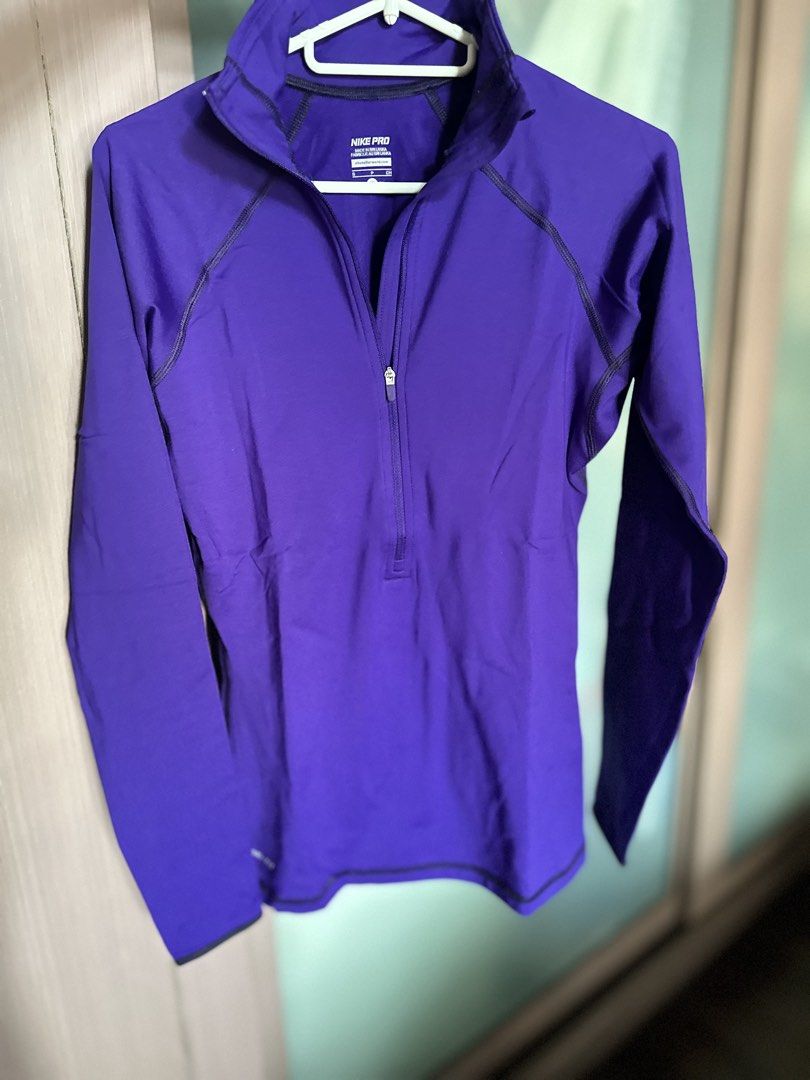 Nike Pro Purple Long Sleeve Half Zip Training Top Size S (Category: Activewear) located in Mandaluyong City. Submitted by TheWeekendProject (Listing ID 1463207115, Image 1). Description: - Purple Nike Pro long sleeve top - Convenient half-zip design - Comfortable and breathable fabric - Ideal for training sessions or everyday wear - Showcases the Nike Pro logo - Perfect for an active lifestyle.