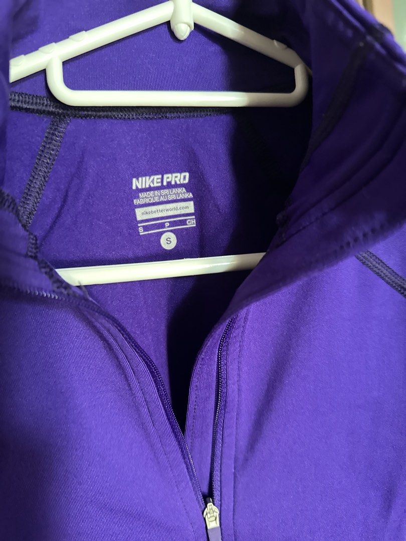 Nike Pro Purple Long Sleeve Half Zip Training Top Size S (Category: Activewear) located in Mandaluyong City. Submitted by TheWeekendProject (Listing ID 1463207115, Image 3). Description: - Purple Nike Pro long sleeve top - Convenient half-zip design - Comfortable and breathable fabric - Ideal for training sessions or everyday wear - Showcases the Nike Pro logo - Perfect for an active lifestyle.
