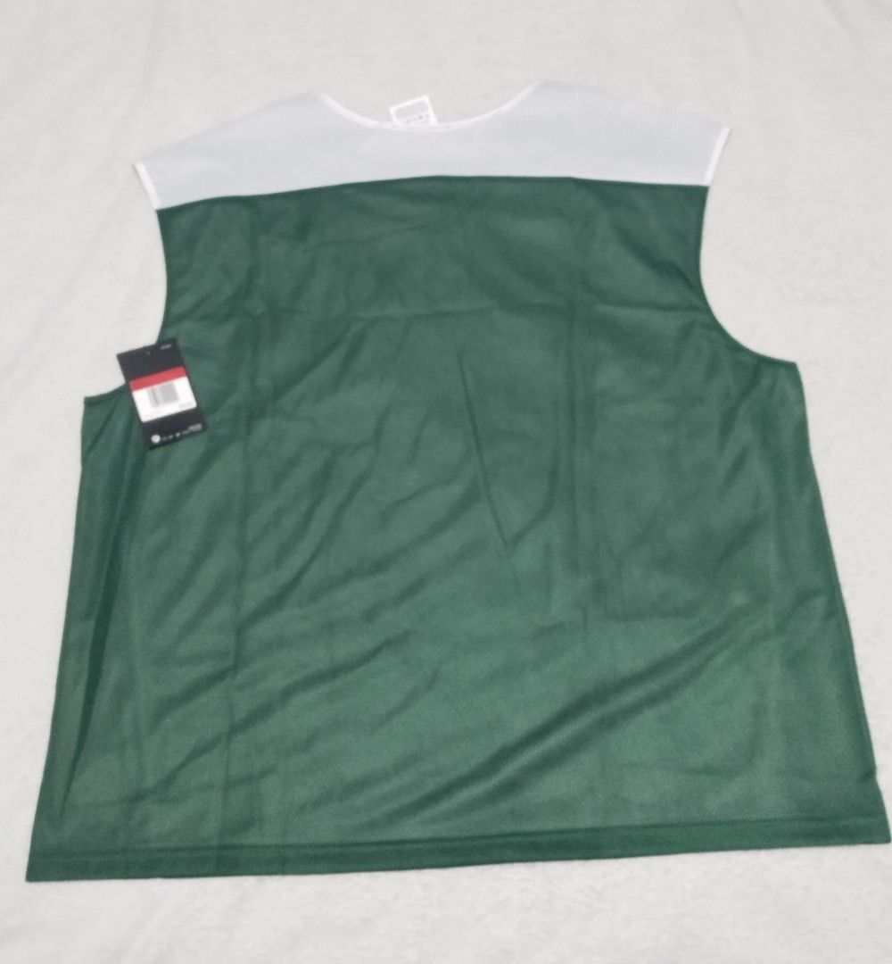 Nike Reversible Tank Top (Category: Activewear) located in Angeles City. Submitted by thehustlersculture (Listing ID 1463231693, Image 2). Description: Nike Reversible green and white -large on tag (american size) -actual dimes width 25 x length 28 -embroided swoosh logo -complete tags -$20 original price -US store bought not thrifted.