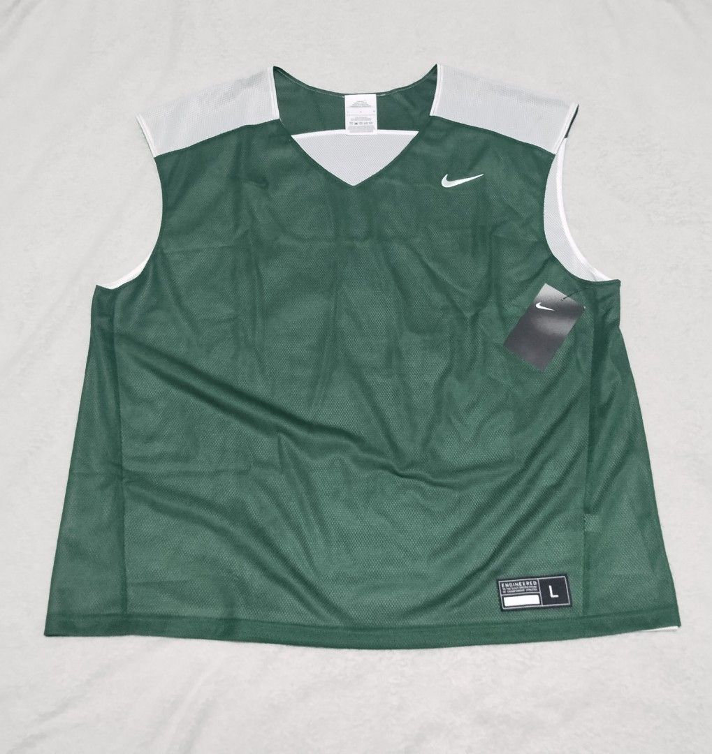 Nike Reversible Tank Top (Category: Activewear) located in Angeles City. Submitted by thehustlersculture (Listing ID 1463231693, Image 1). Description: Nike Reversible green and white -large on tag (american size) -actual dimes width 25 x length 28 -embroided swoosh logo -complete tags -$20 original price -US store bought not thrifted.