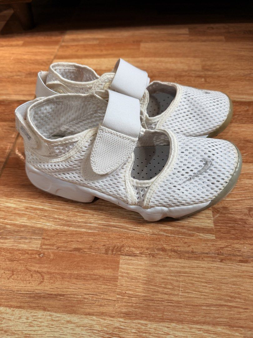 Nike Rift (Category: Sneakers) located in Cagayan de Oro. Submitted by gfscm (Listing ID 1463182010, Image 1). Description: - White Nike NON tabi - Breathable mesh material - Easy velcro strap for quick on and off - Ideal for kids or grown ups - Soles have minor wear but plenty of life remaining - Perfect for playtime and walking Euro 36 23cm not tabi.