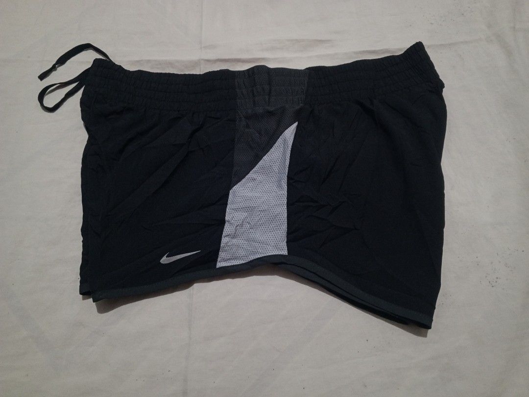 Nike tritone running shorts (Category: Activewear) located in Santa Maria. Submitted by paulo-garcia21 (Listing ID 1463127105, Image 2). Description: xl on tag 30 to 38 by 10 12.5 no flaws.