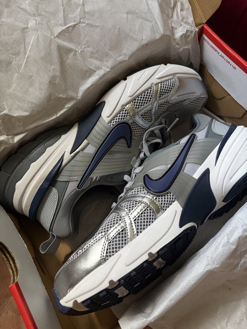 Nike V2K Run Wolf Grey/Monarch/Navy Sneakers (Category: Sneakers) located in Manila. Submitted by ansgav (Listing ID 1463152116, Image 1). Description: Nike V2K Run sneakers - Colorway: Wolf Grey, Monarch, Navy - Size: US Men's 11 / US Women's 12.5 / EUR 45 - Style: Retro-inspired running shoes - Condition: Good as new, used once for only a few hours; has a small stain on the shoelace - Comes with original box - Bought for 7k, selling only for th