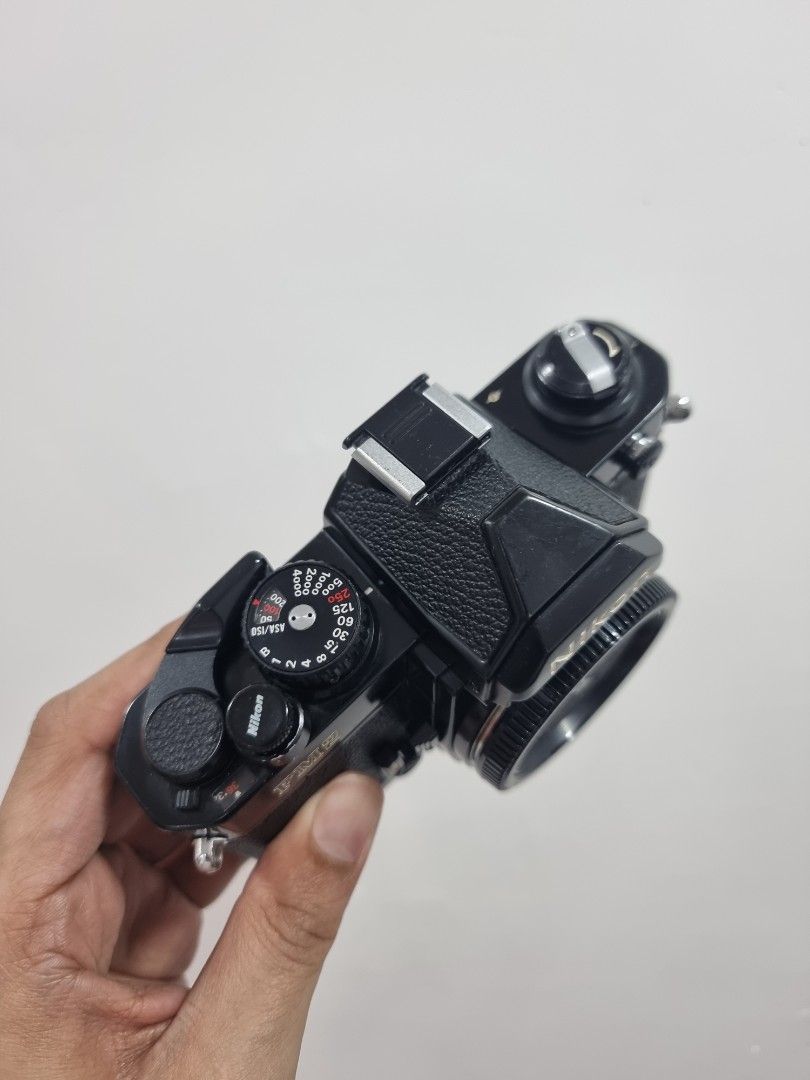 Nikon Fm2 (Category: Cameras) located in San Fernando. Submitted by filmburrrn_ (Listing ID 1463128632, Image 2). Description: Nikon FM2 with body cap and original nikon soft button release. recently cla'd by feelmanila. working meter. bit brassing at the bottom edges. overall is in great condition..