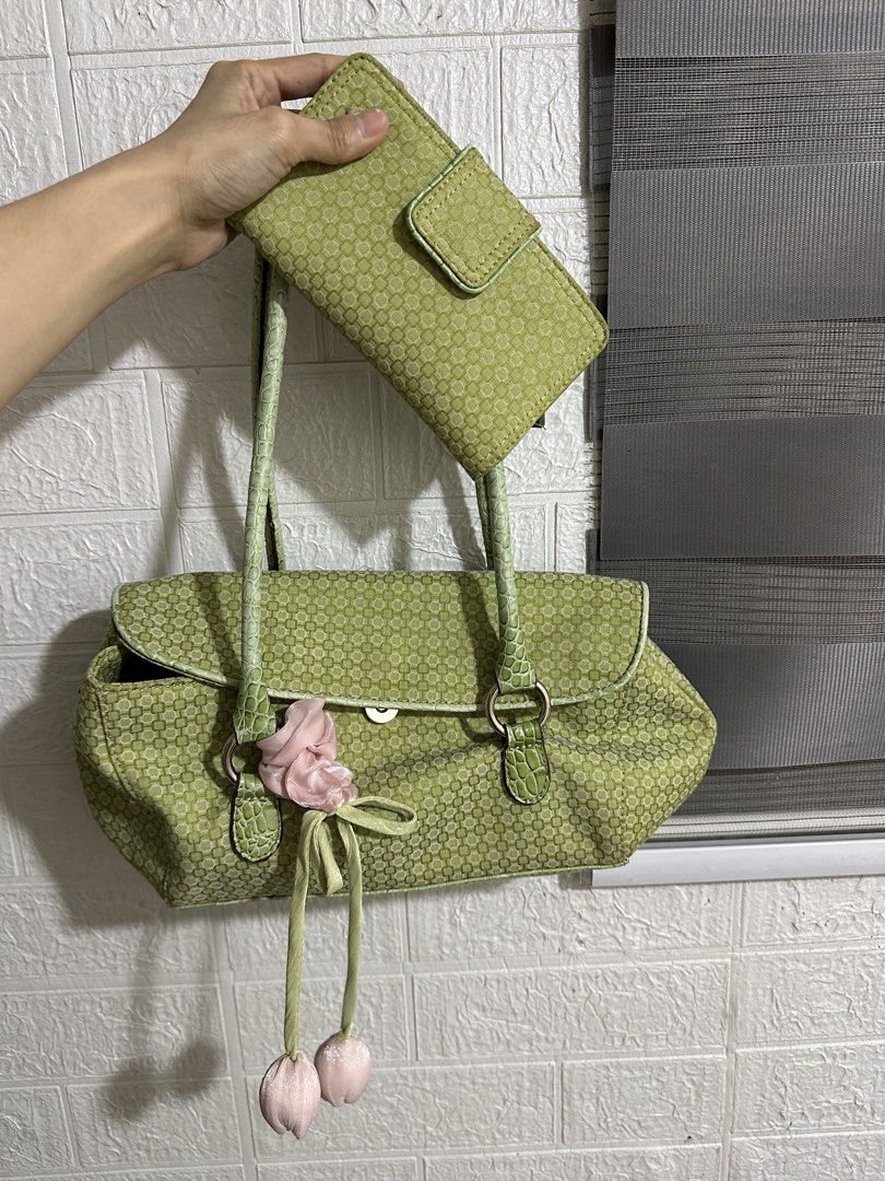 Nine West Green Patterned Handbag and Matching Wallet Set (Category: Luxury Bags & Wallets) located in Pasay City. Submitted by jan_0828 (Listing ID 1463126141, Image 1). Description: - Cute green Nine West handbag and matching wallet set. - Handbag features a patterned exterior and fabric interior with a zip pocket. - Wallet includes multiple card slots and ID windows. - Both pieces showcase a subtle geometric pattern. - Ideal for everyday use..
