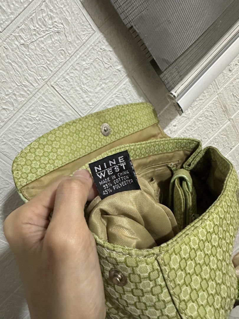 Nine West Green Patterned Handbag and Matching Wallet Set (Category: Luxury Bags & Wallets) located in Pasay City. Submitted by jan_0828 (Listing ID 1463126141, Image 2). Description: - Cute green Nine West handbag and matching wallet set. - Handbag features a patterned exterior and fabric interior with a zip pocket. - Wallet includes multiple card slots and ID windows. - Both pieces showcase a subtle geometric pattern. - Ideal for everyday use..