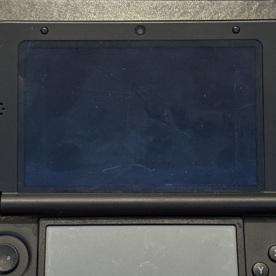 Nintendo 3DS XL Silver Negotiable (Category: Nintendo) located in Quezon City. Submitted by ailoqp (Listing ID 1463273436, Image 3). Description: Nintendo 3DS XL Silver Negotiable Authentic Nintendo 3DS XL handheld console. Shell: Replaced to silver shell Inclusions: Console unit, charger and original shell Condition: Working condition but with minor issues that do not affect gameplay or performance: Screen has light scratches Circle pad missing 