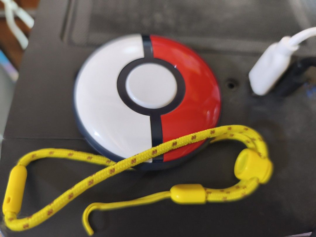 Nintendo Pokemon GO Plus+ (Pokemon GO Plus Plus) (Category: Controllers) located in Daet. Submitted by JAOS123 (Listing ID 1463136105, Image 2). Description: - Comes with a convenient yellow lanyard. - Officially licensed by The Pokemon Company and Nintendo. - NO WARRANTY - NO PROTECTIVE CASE - Box not included, I left it in Manila. - The device still works. - Never modified the device. Price is fixed. Can't do lower. Issue: scratches and dirt (S