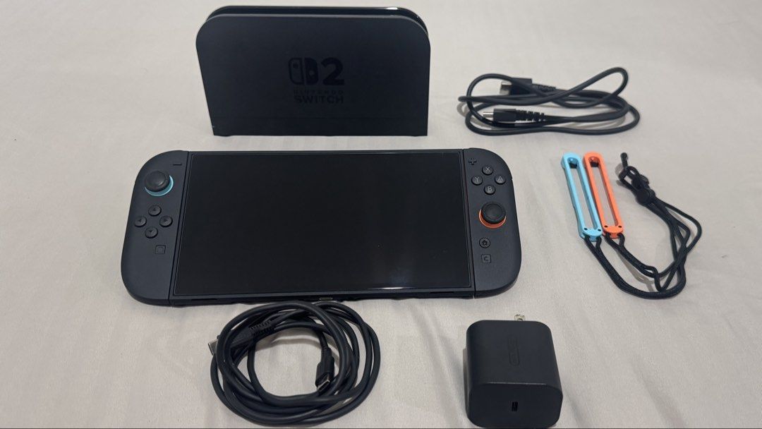 Nintendo Switch 2 Console (Category: Nintendo) located in Manila. Submitted by vince.eee (Listing ID 1463272035, Image 1). Description: - Nintendo Switch 2 Console - Includes Dock - AC Adapter - HDMI Cable - Joy-Con Straps (Blue and Orange) - All cables .