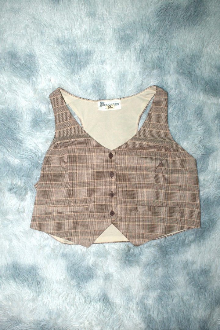 No Boundaries Plaid Vest XL (Category: Vests) located in Taguig. Submitted by chloe_clothingco. (Listing ID 1463229183, Image 1). Description: - Brown plaid vest - Brand: No Boundaries - Size: XL - V-neckline - Button-up front - One pocket on the right side - Great for layering over t-shirts or long-sleeves.