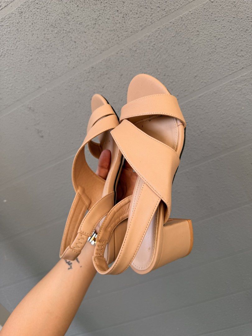 Nude Slingback Block Heels Size 38 (Category: Heels) located in Santa Rosa. Submitted by hello2ndhandlove (Listing ID 1463145717, Image 2). Description: - Nude slingback heels - Block heel - Strappy front design - Elastic strap at the back for a secure fit - Size: 38 - Condition: Lightly worn, some dirt on soles - Perfect for dressing up or down Super comfy used once Rfs: i ordered 2 very similar designs.
