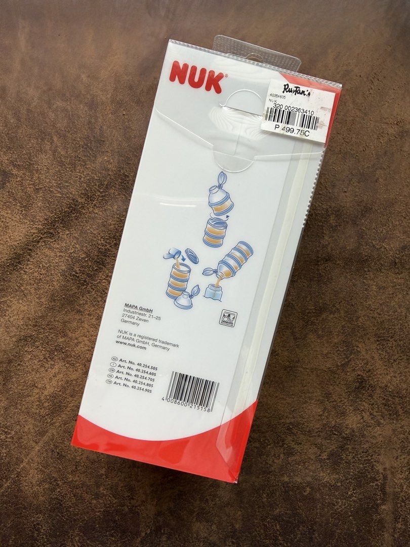 NUK Multi-section Portable Milk Powder Container (Category: Breastfeeding & Bottle Feeding) located in Quezon City. Submitted by zelev (Listing ID 1463151851, Image 2). Description: - Stackable design: Use individually or stack together. - Individual sealing lids: Dustproof and moisture-proof for freshness. - Easy pour funnel: Mess-free dispensing of milk powder. - Versatile use: Ideal for milk powder, cookies, raisins, and other snacks. - Pre-me
