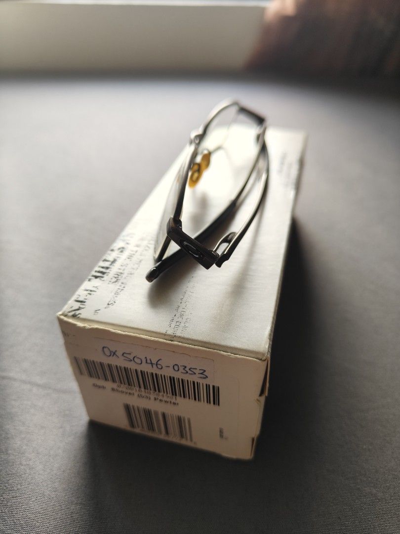 Oakley OX5046-0353 Eyeglasses Frame (Category: Sunglasses & Eyewear) located in Caloocan City. Submitted by crib_of_good_deals (Listing ID 1463119996, Image 3). Description: for collectors or looking ng Oakley specs na may dating. - Brand: Oakley - Model: OX5046-0353 - Color: In Pewter frame with oxidised nose pads - Condition: Clean, ready for new lenses - Includes: Original box - Ideal for: Everyday wear - 100% original. bought it in Singapore 