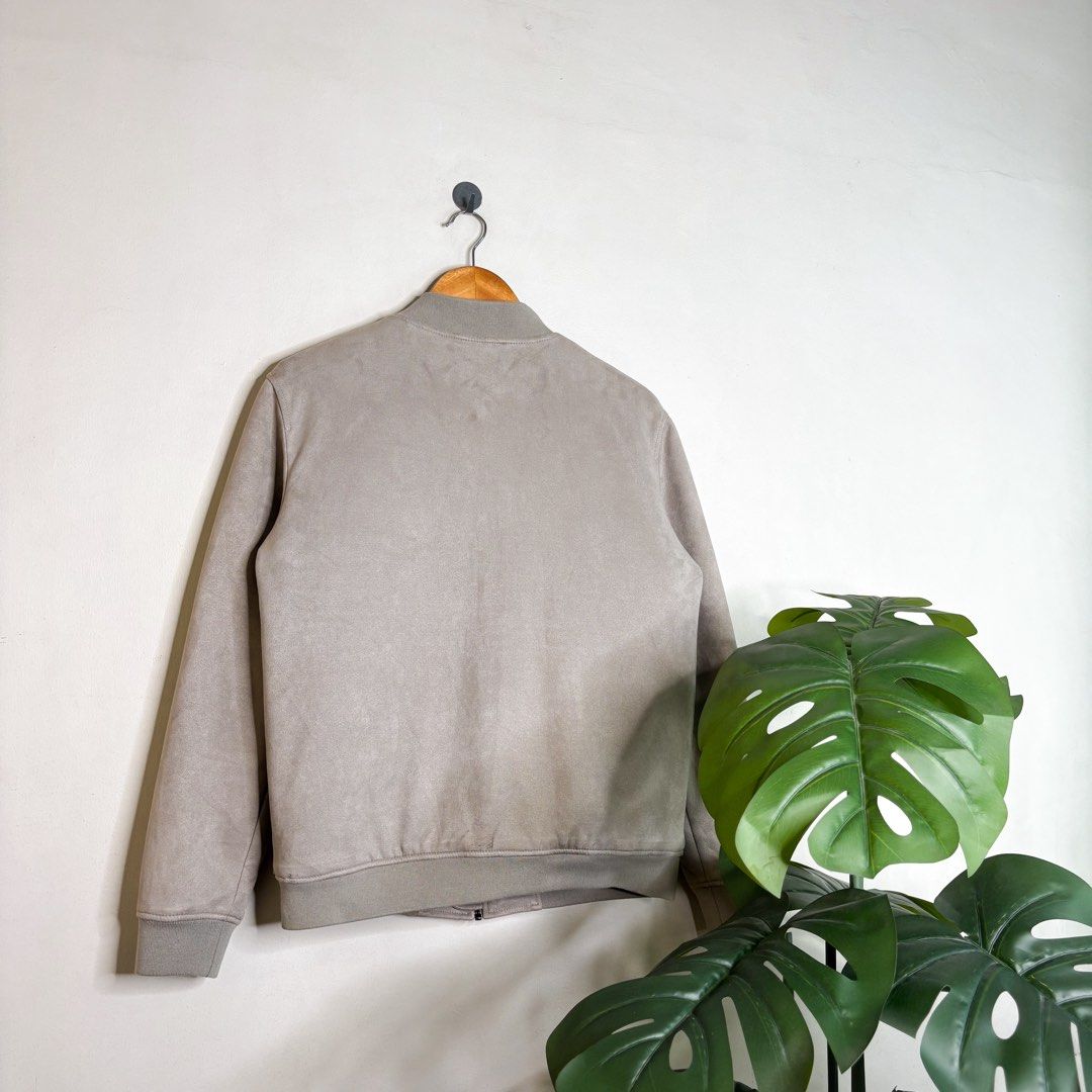 Oat | Bomber Jacket. (Category: Coats, Jackets and Outerwear) located in Manila. Submitted by bypiecesandstories (Listing ID 1463223709, Image 2). Description: Oat | Bomber Jacket. 699 PHP 🧡 Perfect Condition Can Fit — Small to Large Dimensions — W 21.5" L 26" A timeless suede bomber in an Oat shade. Clean, understated, and easy to dress up or down for a more refined casual look. • REMINDERS • — Read the Rules & Guidelines under FAQS. — First to