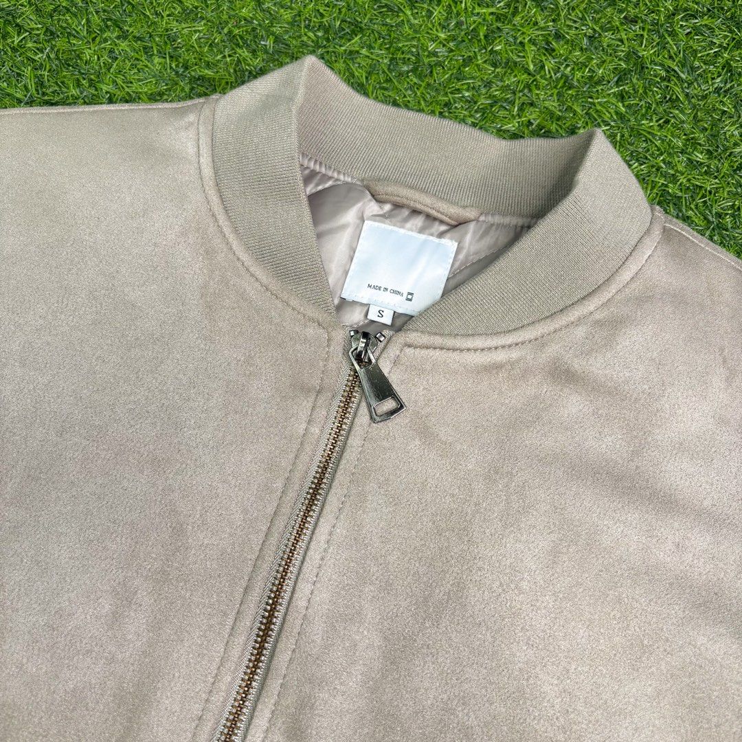 Oat | Bomber Jacket. (Category: Coats, Jackets and Outerwear) located in Manila. Submitted by bypiecesandstories (Listing ID 1463223709, Image 3). Description: Oat | Bomber Jacket. 699 PHP 🧡 Perfect Condition Can Fit — Small to Large Dimensions — W 21.5" L 26" A timeless suede bomber in an Oat shade. Clean, understated, and easy to dress up or down for a more refined casual look. • REMINDERS • — Read the Rules & Guidelines under FAQS. — First to