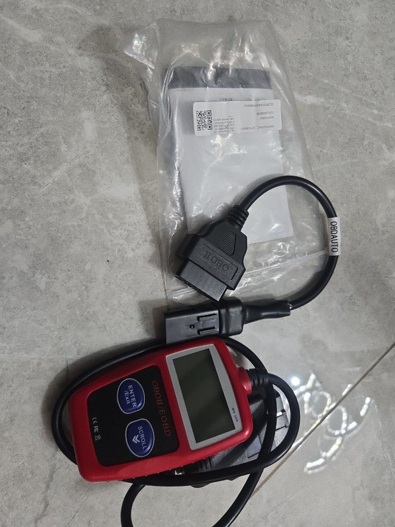 OBD AUTO MS309 OBD2 Scanner Code Reader (Category: Motorcycle Accessories) located in Singapore. Submitted by nerdguy75 (Listing ID 1463226324, Image 1). Description: - OBD AUTO MS309 Code Reader - Reads and clears diagnostic trouble codes (DTCs) - Features a compact LCD screen for easy viewing - Simple button navigation - Includes the main unit and a connecting cable - Standard OBD2 connector for wide compatibility - Ideal for DIY car engine dia