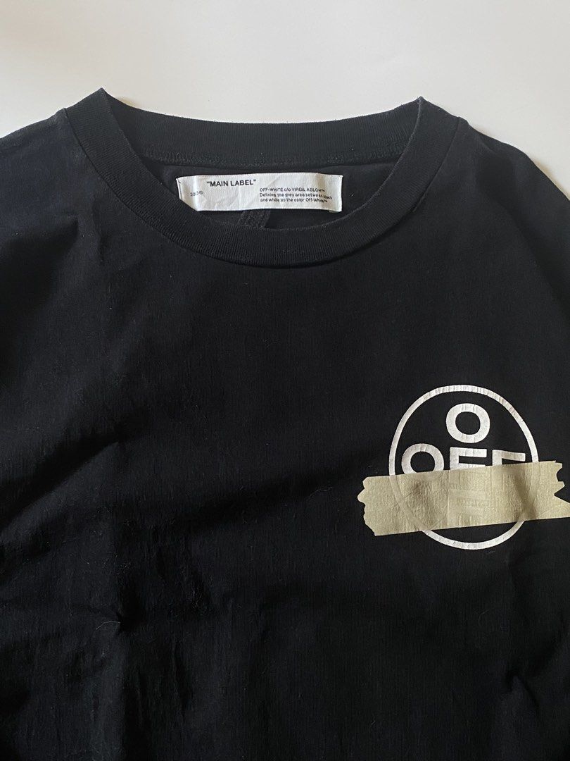 Off White Oversized Tape Arrows Shirt (Authentic) (Category: Tshirts & Polo Shirts ) located in Manila. Submitted by finofindthisart (Listing ID 1463237948, Image 3). Description: Length 31 Width 24 Measured it by inches P1499 Issue: N/A This is a pre-loved/thrifted items and may show minor signs of issue due to its vintage nature. Kindly manage expectations. No refunds or exchanges will be accepted. 📍Pasay City DM for inquiries..