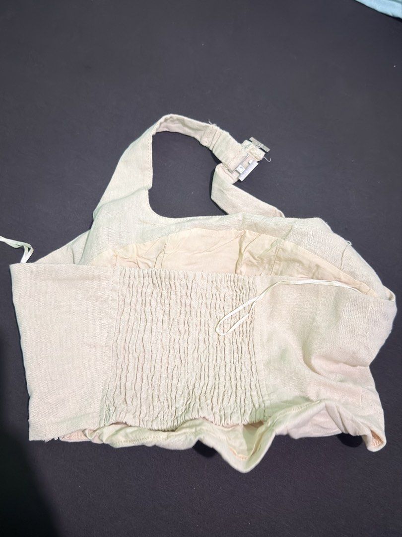 off-white halterneck corset like new (Category: Blouses) located in Manila. Submitted by _declutterprelovezz (Listing ID 1463263864, Image 2). Description: Super ganda neto off-white halterneck like new.