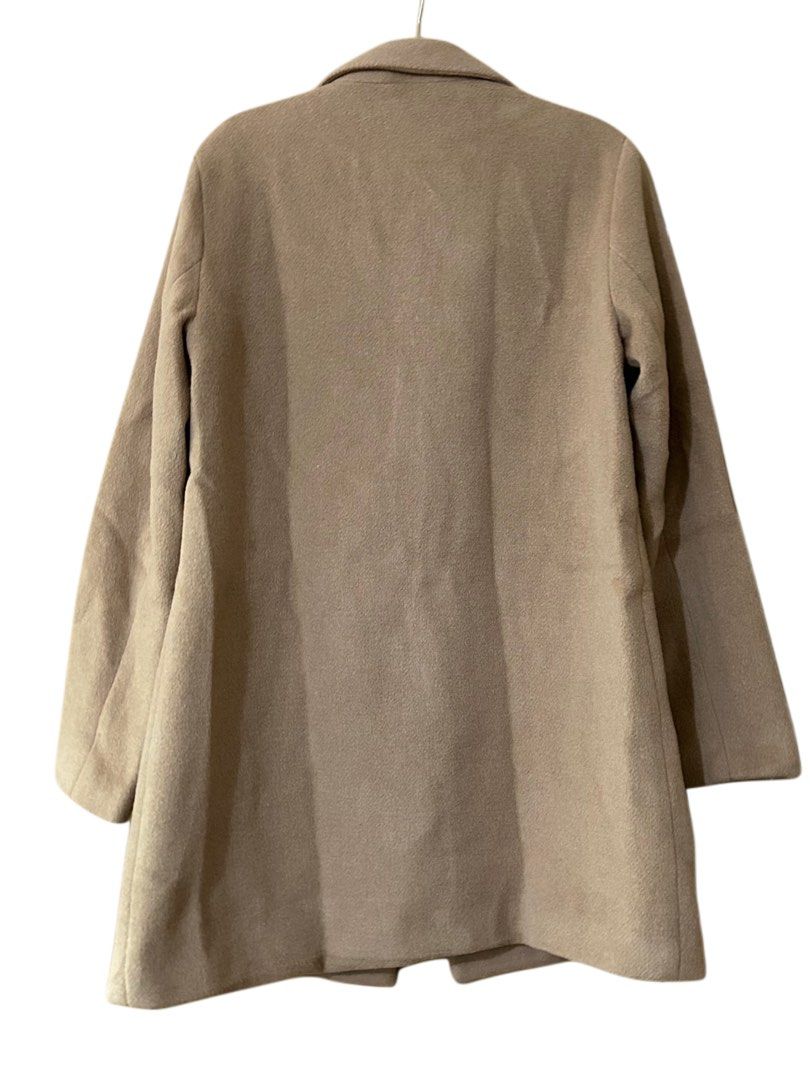 Old Navy Tan Wool Blend Single Button Coat Size S (Category: Coats, Jackets and Outerwear) located in Baguio. Submitted by tresmariascloset13 (Listing ID 1463228249, Image 2). Description: - Classic tan coat from Old Navy - Wool blend material - Single button closure - Two front pockets - Fully lined interior - Ideal for layering in cooler weather.