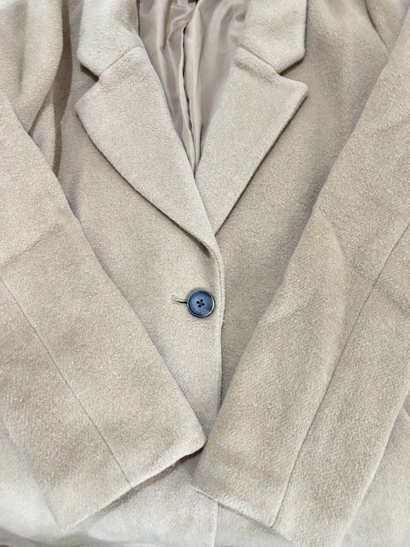Old Navy Tan Wool Blend Single Button Coat Size S (Category: Coats, Jackets and Outerwear) located in Baguio. Submitted by tresmariascloset13 (Listing ID 1463228249, Image 3). Description: - Classic tan coat from Old Navy - Wool blend material - Single button closure - Two front pockets - Fully lined interior - Ideal for layering in cooler weather.