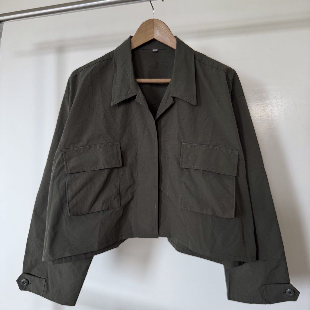 Army Green Cropped Utility Jacket with Pockets (Category: Coats, Jackets and Outerwear) located in Baguio. Submitted by jnks_preloved (Listing ID 1463164389, Image 1). Description: Army green cropped utility jacket (japanese brand, LOOKS GU hehe) Two chest pockets with button closures, Button-up front, Long sleeves with button cuffs L on tag (S to L) Good as new, no flaws, used once only.