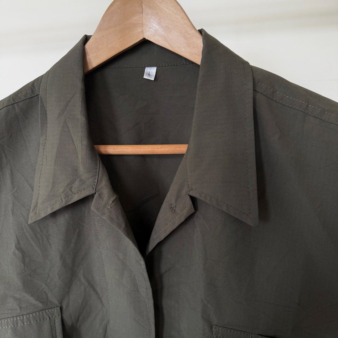 Army Green Cropped Utility Jacket with Pockets (Category: Coats, Jackets and Outerwear) located in Baguio. Submitted by jnks_preloved (Listing ID 1463164389, Image 2). Description: Army green cropped utility jacket (japanese brand, LOOKS GU hehe) Two chest pockets with button closures, Button-up front, Long sleeves with button cuffs L on tag (S to L) Good as new, no flaws, used once only.