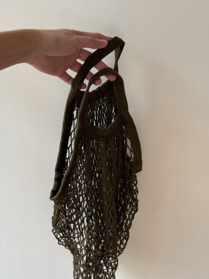 Olive Green String Net Shopping Bag (Category: Tote Bags) located in Quezon City. Submitted by sayshops (Listing ID 1463230698, Image 2). Description: Reusable net bag Dark olive green like new. used once.