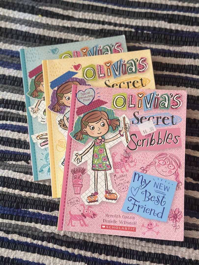 Olivia's Secret Scribbles Book Set (Category: Children's Books) located in Baguio. Submitted by cherylcaps95 (Listing ID 1463125923, Image 1). Description: - Set of 3 Olivia's Secret Scribbles books - Titles: 'Amazing Acrobats', 'The Big Chicken Mystery', 'My New Best Friend' - Ideal for young readers who enjoy stories - Pages are clean and intact - Ready for a new home 250 set.