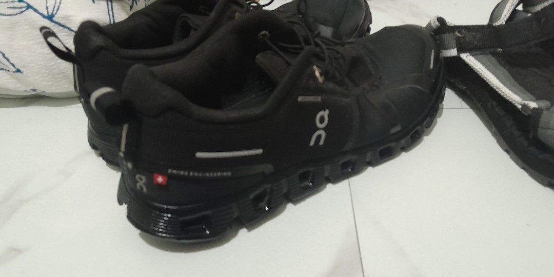 On cloud black 7.5 us men plus sandals (Category: Sneakers) located in Manila. Submitted by dreamweaver25 (Listing ID 1463157727, Image 3). Description: barely used on cloud black 7.5 us men free fubu hiking sandals.