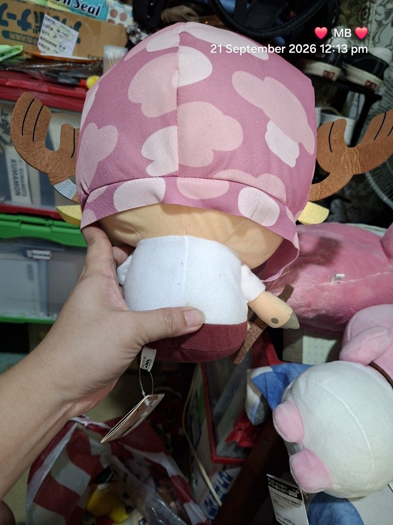 One Piece Chopper Plush Toy Standee (Category: Plushies & Soft Toys) located in Lucena. Submitted by dai_suki (Listing ID 1463321755, Image 2). Description: - Official One Piece Chopper plush toy - Standee version - Features the iconic pink hat with a cross - Adorable and collectible design - Perfect gift for any One Piece enthusiast.