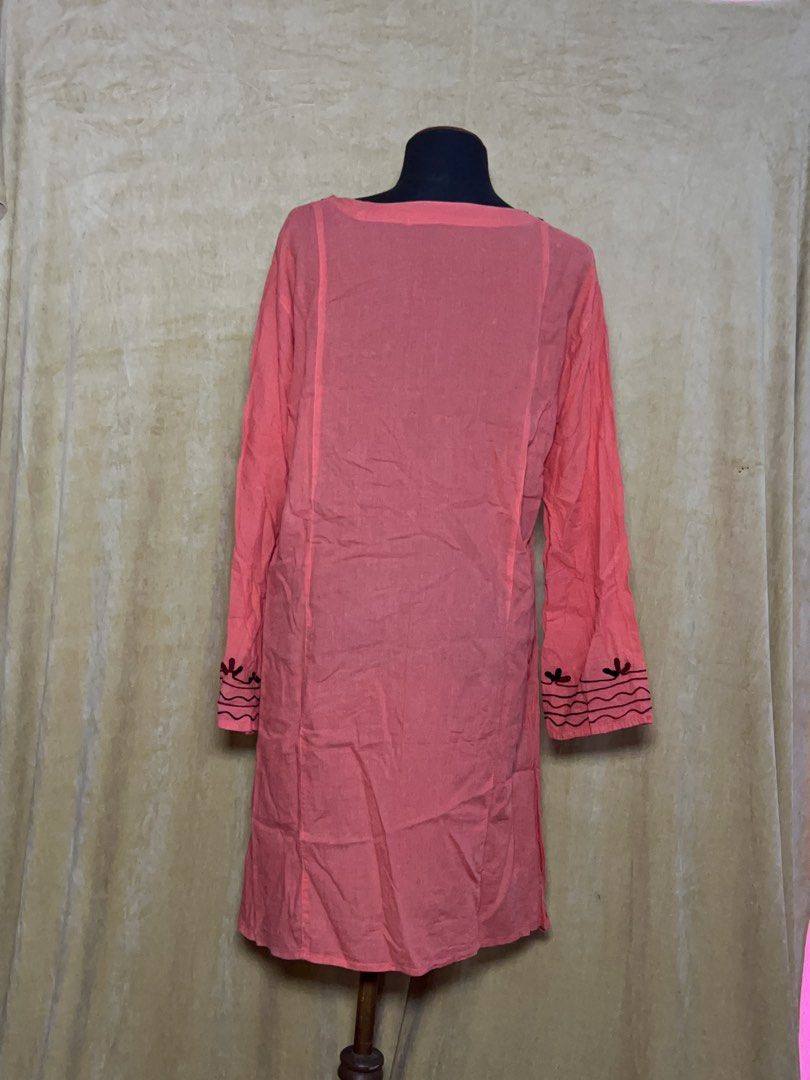 Orange Embroidered Tunic Top Long Sleeves (Category: Others Tops) located in Batangas. Submitted by mkjgb (Listing ID 1463125406, Image 2). Description: Shoulder width is 19” Length from neckline is 36” Waist is 46” Has slits on both sides - Pretty orange tunic top - Features intricate embroidery on V-neck and cuffs - Long sleeves with embroidered details - Versatile for casual wear or layering - Made from lightweight fabric - Effortless to style