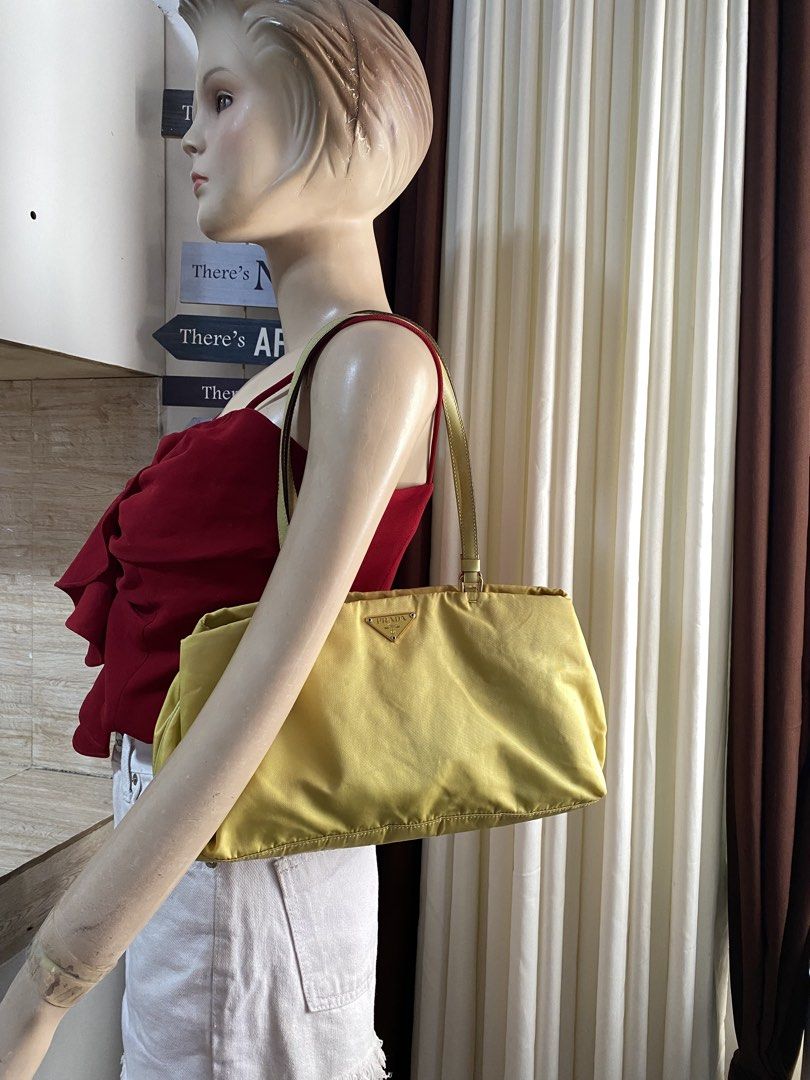 Orig vintage Prada shoulder bag (Category: Luxury Bags & Wallets) located in Tagum. Submitted by amarasluxbag (Listing ID 1462742765, Image 1). Description: With flaws dirt/stain di ko nalabahan Nylon material Good condition .