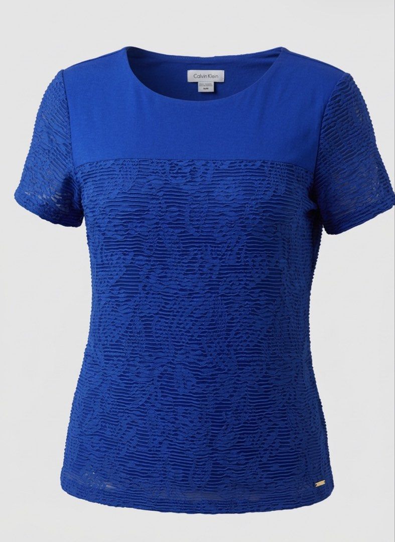 Original Calvin Klein Blue Lace Blouse (Category: Blouses) located in Manila. Submitted by jhcollections (Listing ID 1463152944, Image 2). Description: Original Calvin Klein Blue lace Blouse Medium on label Actual photos posted J&t/Grab/lalamove .