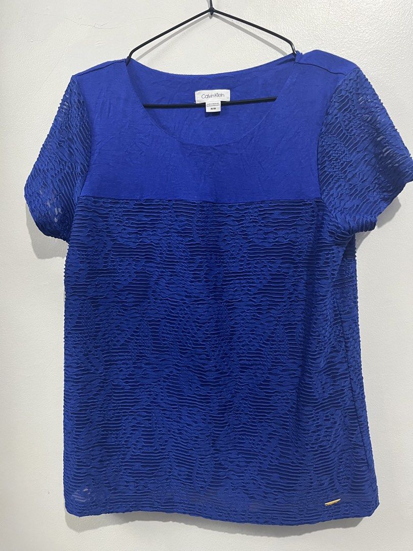 Original Calvin Klein Blue Lace Blouse (Category: Blouses) located in Manila. Submitted by jhcollections (Listing ID 1463152944, Image 3). Description: Original Calvin Klein Blue lace Blouse Medium on label Actual photos posted J&t/Grab/lalamove .