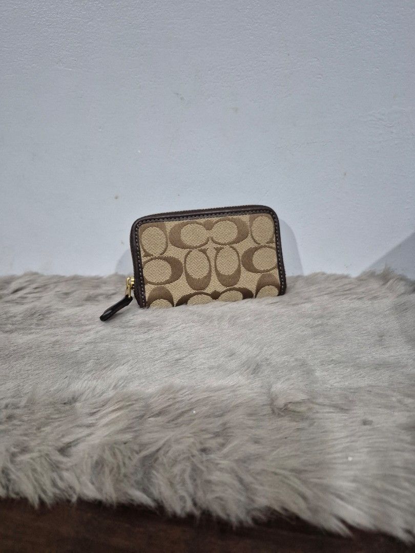 Original Coach Essential Card Wallet (Category: Wallets & Card holders) located in Cavite. Submitted by chaellebrandsluxe (Listing ID 1463248556, Image 1). Description: Selling low,no inclusion LP posted already what you see is what you get.