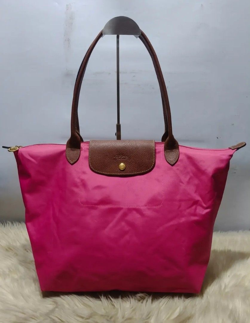 Original LONGCHAMP LLH (Category: Shoulder Bags) located in Cabuyao City. Submitted by secondhand.shop.ph (Listing ID 1463311766, Image 1). Description: Sale❗️Sale❗️Sale❗️ ₱2,299 Original LONGCHAMP Preloved Large Long Handle Nylon/genuine leather trim 📌First to pay!.
