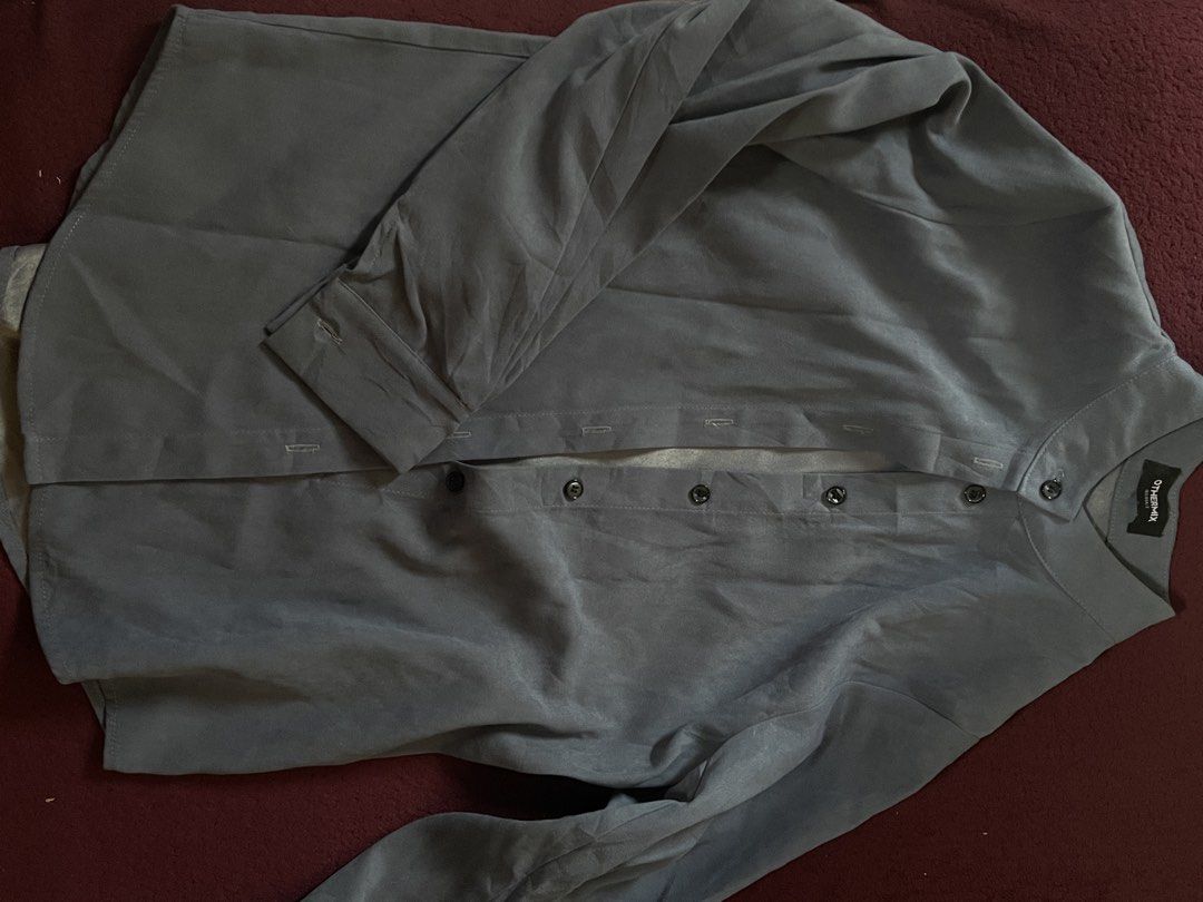 OTHERMIX Blue Grey Button Up Shirt (Category: Coats, Jackets and Outerwear) located in Tanza. Submitted by pattycakex (Listing ID 1463316053, Image 1). Description: - Grey button-up shirt from OTHERMIX - Mandarin collar style - Black buttons down the front - Button closure on sleeve cuffs - Measurements available in photos - Perfect for casual or smart casual outfits.