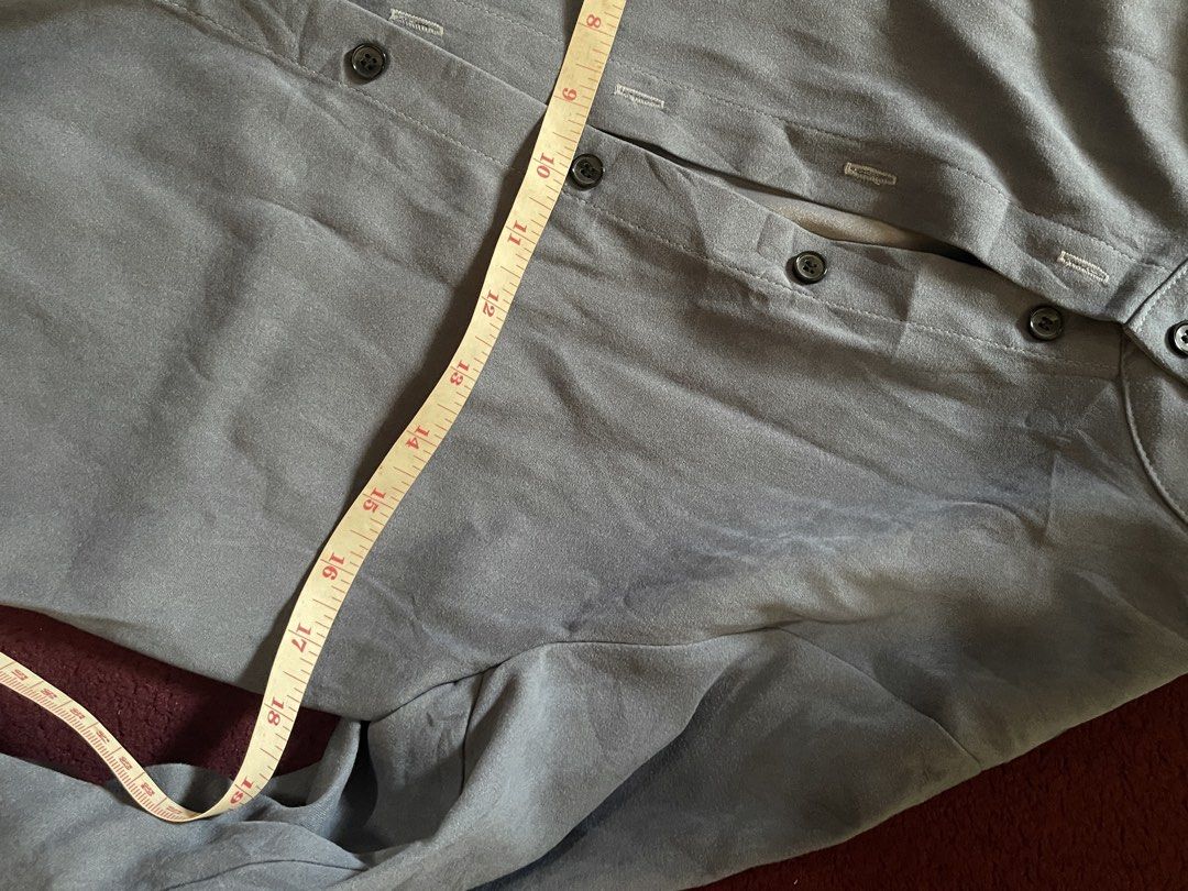 OTHERMIX Blue Grey Button Up Shirt (Category: Coats, Jackets and Outerwear) located in Tanza. Submitted by pattycakex (Listing ID 1463316053, Image 3). Description: - Grey button-up shirt from OTHERMIX - Mandarin collar style - Black buttons down the front - Button closure on sleeve cuffs - Measurements available in photos - Perfect for casual or smart casual outfits.