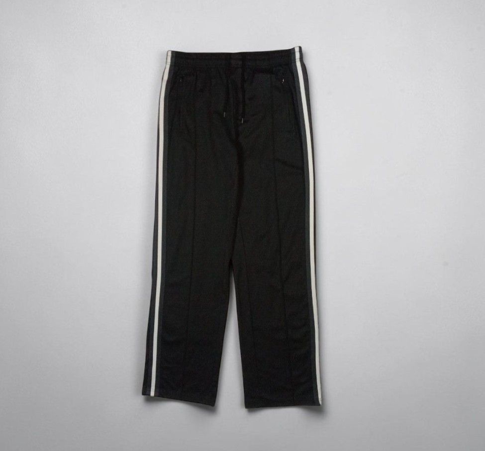 Our Legacy - Cristopher Nying - Side Taped Track Pants (Category: Joggers) located in Manila. Submitted by kinstugi.pieces (Listing ID 1463285077, Image 1). Description: Sizes: L-XL Men's (48) Dimes: 16 inches, Wdth 9.5 inches, Crtch 31.5 inches, Insm 42 inches, Lngth 9 inches, LG Opng Authentic/Legit Pls check every picture details by detail for info. Color Rate: 9.5/10 Condition: 9.5/10 Presentable to Use Add Shipping fee.