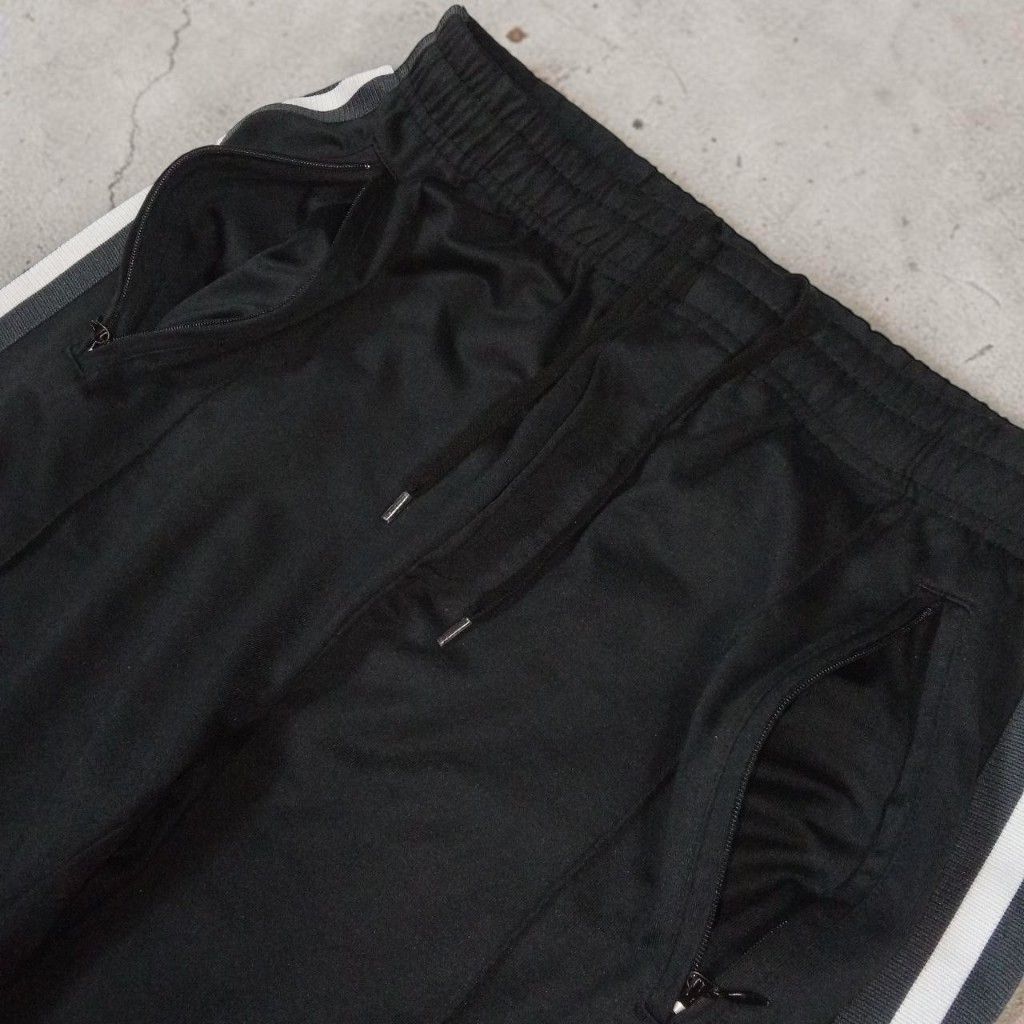 Our Legacy - Cristopher Nying - Side Taped Track Pants (Category: Joggers) located in Manila. Submitted by kinstugi.pieces (Listing ID 1463285077, Image 3). Description: Sizes: L-XL Men's (48) Dimes: 16 inches, Wdth 9.5 inches, Crtch 31.5 inches, Insm 42 inches, Lngth 9 inches, LG Opng Authentic/Legit Pls check every picture details by detail for info. Color Rate: 9.5/10 Condition: 9.5/10 Presentable to Use Add Shipping fee.