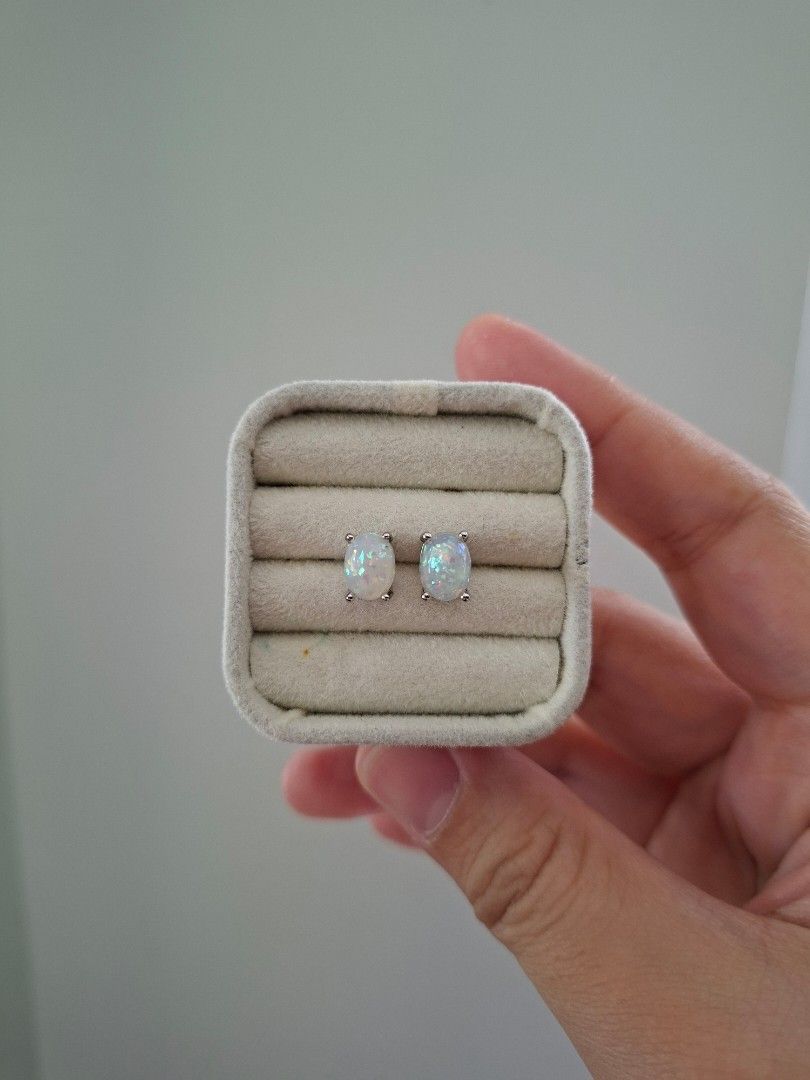 Oval Opal Stone Stud Earrings (Category: Earrings) located in Dasmarinas. Submitted by danabrie22 (Listing ID 1463199880, Image 1). Description: very well-made, excellent crafstmanship 10/10 condition brand new stainless steel & opal stones made in Hongkong.