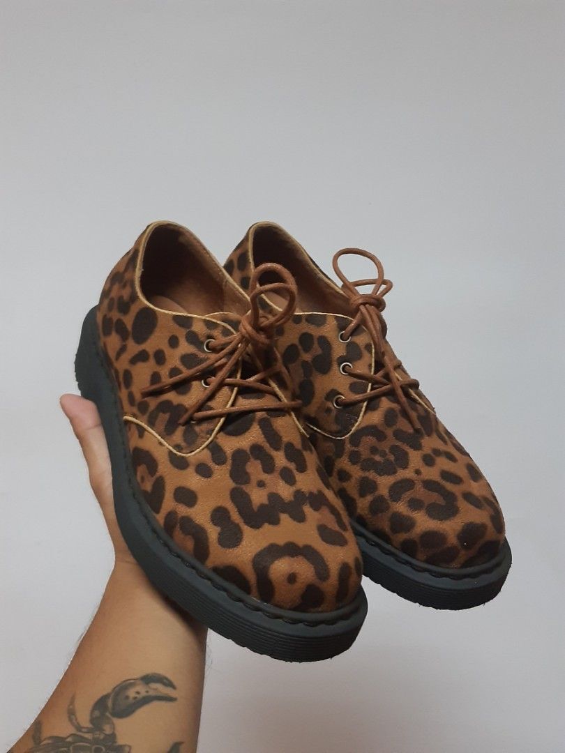 SALE: Oxbridge Town leopard print platform oxfords (Category: Loafers) located in Bauang. Submitted by 2ndskinz_by.irie (Listing ID 1463057541, Image 2). Description: Oxbridge Town leopard print platform oxfords bold animal print patterned faux suede upper, a three-eyelet lace-up design with matching brown laces, and a thick, textured chunky black platform sole. size: 38 eu /7-7.5 us unisex like new condition used 1x only SALE: PHP 1,250 + sf fix