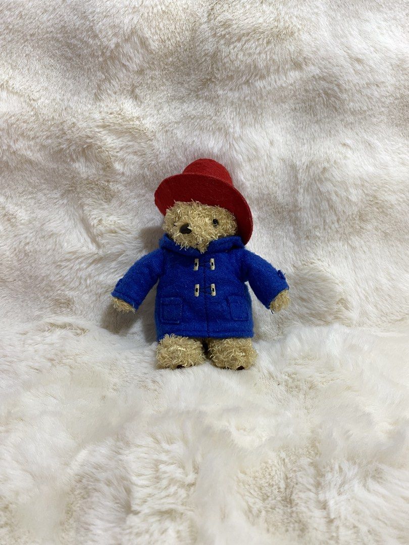 Paddington Bear Plush Charm (Category: Plushies & Soft Toys) located in Kalibo. Submitted by ollie_stuffshop (Listing ID 1463175185, Image 1). Description: Before you send your inquiries: ❗️Last Price is already posted ❗️Manage your expectations, WYSIWYG ❗️May need washing ❗️Dropoff is every Wednesday & Sunday - Adorable Paddington Bear plushie in his signature blue coat and red hat. - Perfect for collectors or fans of these beloved characters. -