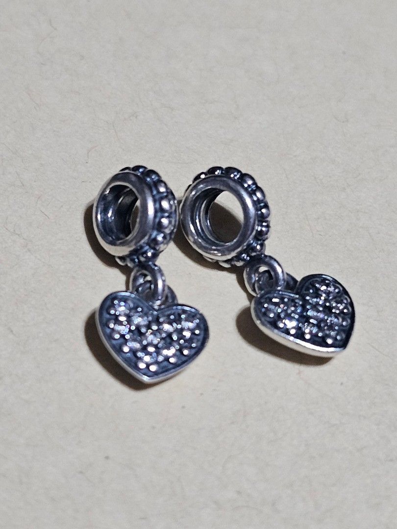 Pandora pave hearts dangle charms (Category: Charms) located in Manila. Submitted by onlinesmartshopping12 (Listing ID 1463275946, Image 2). Description: 1500 each or set for 3k with zirconia stones original no issue.