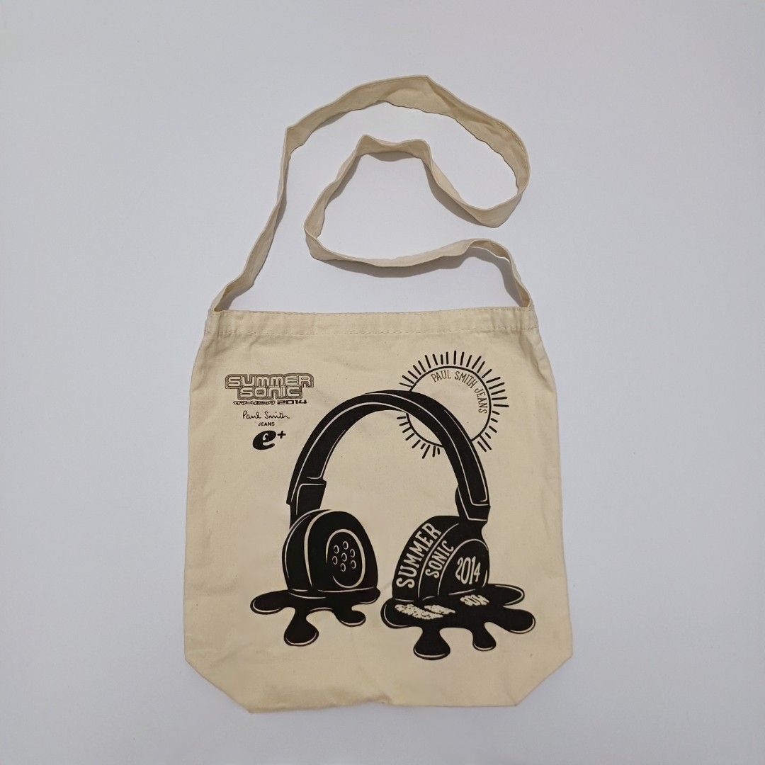 Paul Smith Summer Sonic 2014 Tote Bag (Category: Tote Bags) located in Pasig City. Submitted by padillaaub64242 (Listing ID 1463237344, Image 1). Description: - Summer Sonic 2014 Canvas Tote Bag - Features a cool Paul Smith design - Graphic includes headphones and sun - Perfect for everyday essentials - Made in China.