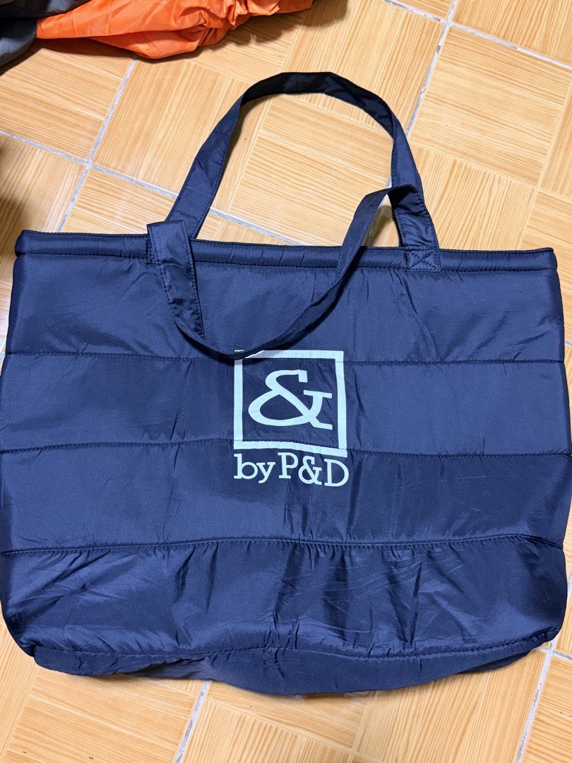 P&D black Puffer Tote Bag with Leopard Print Lining (Category: Tote Bags) located in Paete. Submitted by skydruemadison (Listing ID 1463248102, Image 3). Description: - black puffer tote bag - Features a cool leopard print lining - Secure zipper closure - Ideal for everyday use or travel - Spacious interior for all your essentials - Sturdy and reliable handles - Stylish quilted design for a puffy aesthetic.