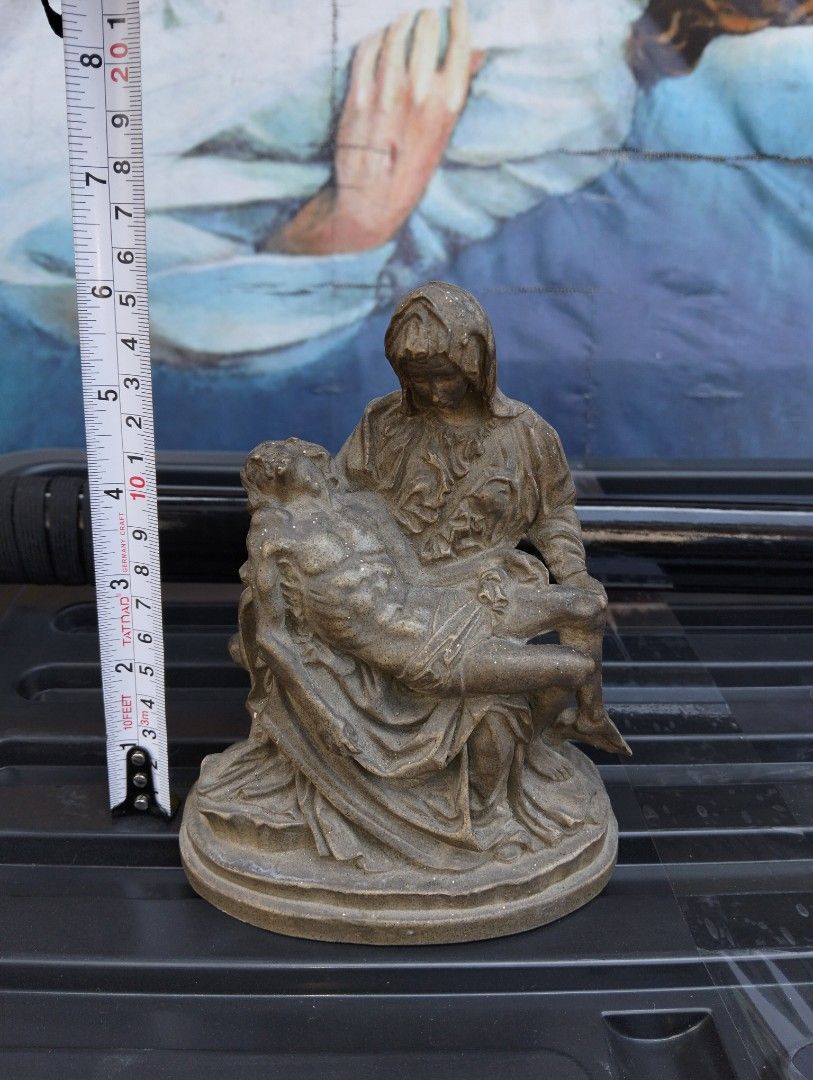 Pieta Statue Sculpture Religious Art (Category: Other Home Decor) located in Manila. Submitted by raymundm36884 (Listing ID 1463250441, Image 2). Description: - Pieta religious statue: Mary holding the body of Jesus. - Features a weathered, antique aesthetic. - Approximately 7 inches tall. - Ideal for home altars or display shelves. - A meaningful devotional piece..